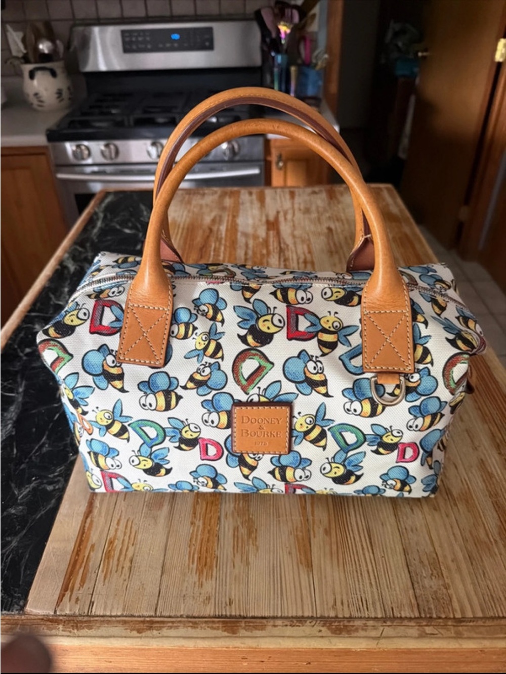 Dooney & Bourke White Bee Print Cosmetic Satchel with Tan Leather Trim